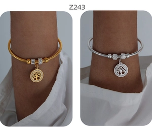 Dettagli dei bracciali albero della vita con perline di cristallo in oro e argento
