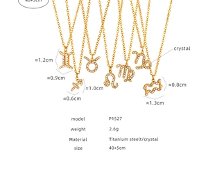Macro view of gold titanium zodiac necklaces with white crystal pendants and measurements