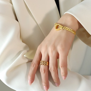 Gold vintage heart locket chunky chain bracelet and matching ring set on model