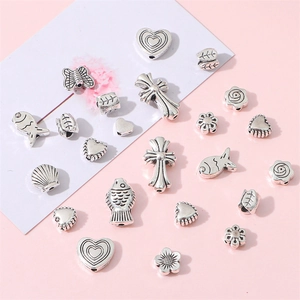 Colgantes de lazo flor corazón plata para creación de joyas y collares de bricolaje
