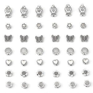 42 pieces vintage silver alloy beads in heart flower and butterfly shapes for DIY jewelry