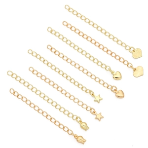 Detail of 14K gold plated extension chains with heart, star and tulip charms for jewelry DIY
