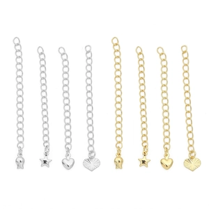 Detail of 14K gold plated necklace extender chains with heart, star and tulip pendants
