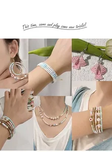 Detail of DIY jewelry set with pastel glass beads on earrings, bracelet and necklace