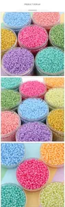 Close-up of colorful 3-4mm pastel glass seed beads in clear jars for DIY jewelry making
