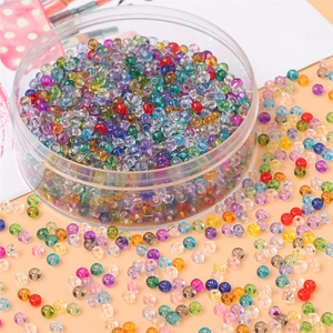 Lot de perles en verre coloré de 2 à 4 mm pour bijoux DIY dans une boîte ronde