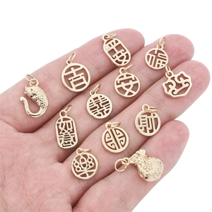Golden Chinese pendants set featuring koi fish, lucky bags, and auspicious characters