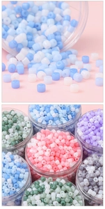 Macro view of colorful cylindrical acrylic beads for DIY jewelry and bracelet making