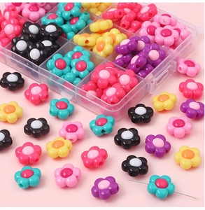 Detail of 16mm colorful acrylic sunflower beads with sorting box and needle for DIY crafts