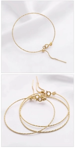 Detailed view of 14K gold-filled adjustable textured bracelet with slider clasp
