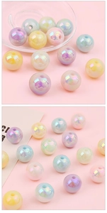 Dettaglio di perle macaron in acrilico iridescente da 16mm per gioielli fai-da-te