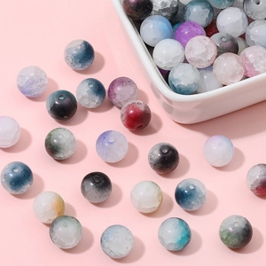 10mm colorful cracked glass beads for DIY jewelry making on a pink background
