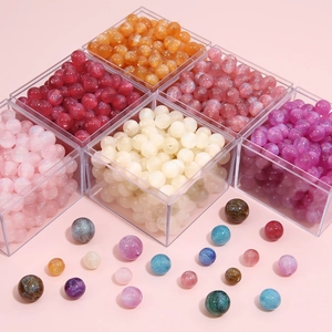 Starry gradient resin beads for DIY jewelry making in a transparent storage box
