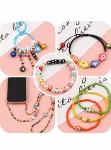 Detailed view of colorful evil eye ceramic beads and letter charms on handmade accessories
