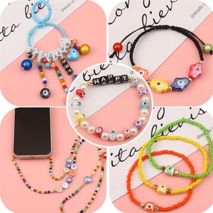 Colorful Bohemian Evil Eye jewelry set including beaded bracelets and phone charms