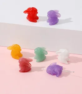 Detailed view of colorful resin rabbit charms with marble texture for DIY jewelry making