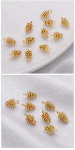 Detail of 14k gold plated pine cone charms with hanging loops for DIY jewelry making