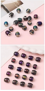Close-up of starry galaxy resin beads with color-shifting glitter and silver metal core