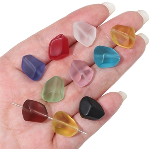 Macro detail of multicolored frosted faceted glass beads for DIY jewelry making