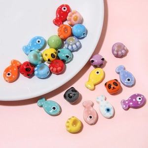Colorful ceramic animal beads including panda and cat shapes for DIY jewelry making