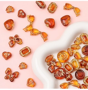 Détails des perles d'ambre en acrylique avec touches dorées pour bijoux DIY