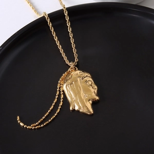 18K gold plated titanium necklace featuring a religious Jesus portrait and tassel rope chain