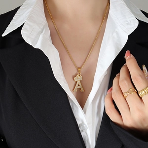 Golden crown initial A pendant necklace with sparkling zircons on elegant rope chain