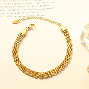 Vintage gold triple-strand chain bracelet in 18k plated stainless steel with lobster clasp