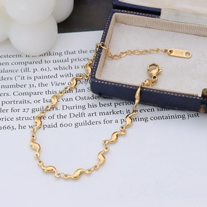 Bracelet chaîne ondulée vintage en plaqué or 18K avec poinçon K18 et fermoir mousqueton
