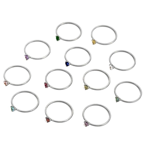Set of 12 heart-shaped birthstone rings with silver-tone bands in various vibrant colors