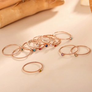 Twisted 18K gold plated stainless steel rings set with colorful round zircon birthstones