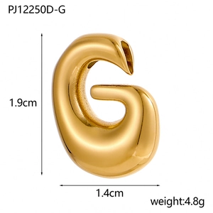 Macro view of 14K gold plated bubble G letter pendant with 1.9cm height measurements