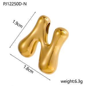 Polished 14K gold plated stainless steel bubble letter N pendant with size and weight detail