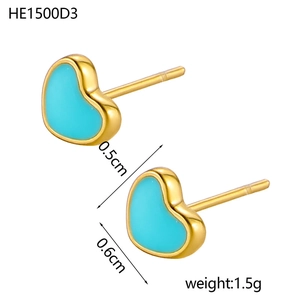 Detail shot of heart stud earrings with blue enamel and dimensions 0.5cm by 0.6cm