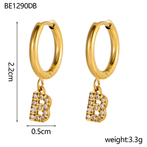 Detailed view of 18K gold plated hoop earrings with zircon pavé letter B charm