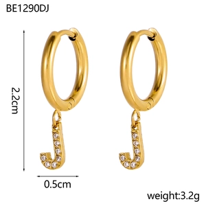 Detail view of gold letter J earring with clear zircons measuring 2.2cm in height