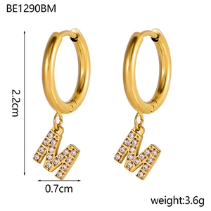 Detail of 18K gold letter M hoop earrings with zircon pave and size measurements
