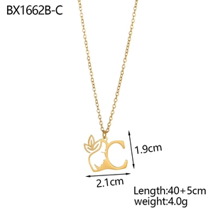 Detail showing 18K gold letter C pendant dimensions 2.1x1.9cm and 40+5cm chain length