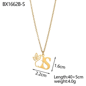 Detail view of 18K gold plated necklace with female face pendant and letter S dimensions