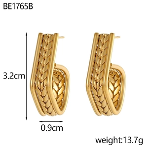 Detailed view of 18K gold wheat-textured C-shape earrings with 3.2cm size measurements