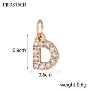 Close-up of rose gold letter D pendant with cubic zirconia and size measurements