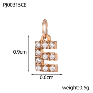 Macro shot of rose gold letter E pendant with dimensions showing 0.9cm height and 0.6g weight