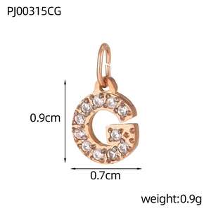 Close-up of rose gold letter G pendant with cubic zirconia inlay and size dimensions