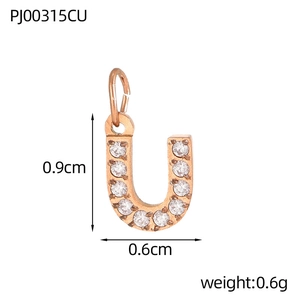 Detailed view of rose gold letter U pendant with sparkling cubic zirconia measurements