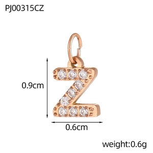 Macro shot of rose gold letter Z pendant with micro pave cubic zirconia stones and measurements