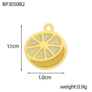 Macro shot of a 1.1cm lemon slice charm with 18K gold plating and yellow enamel inlay