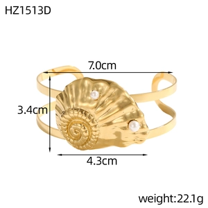 Detail view of 18K gold plated shell nautilus open bangle with size dimensions and weight