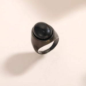 Men's retro gunmetal stainless steel ring featuring a polished oval black ceramic inlay