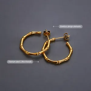 Minimalist gold titanium steel hoop earrings featuring a unique bamboo knot design texture