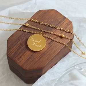 Three-layer gold-plated stainless steel necklace with engraved Good Luck pendant